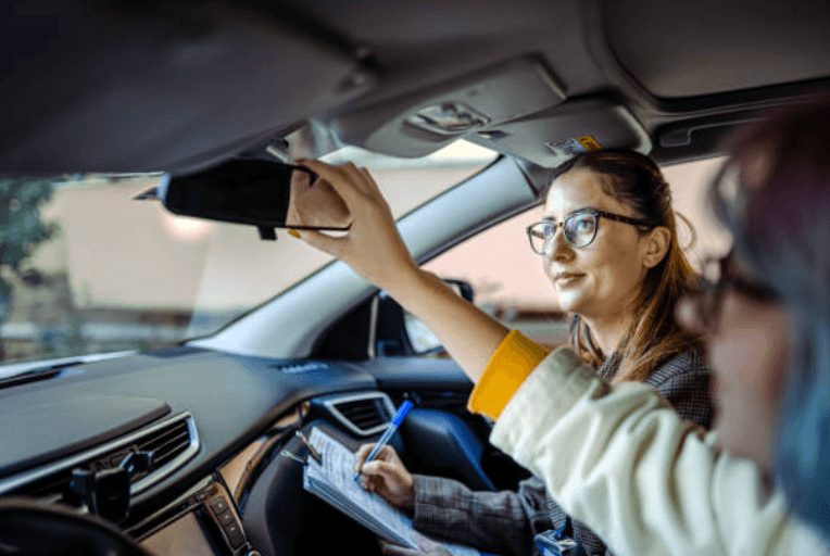 Student behind the wheel during a driving lesson